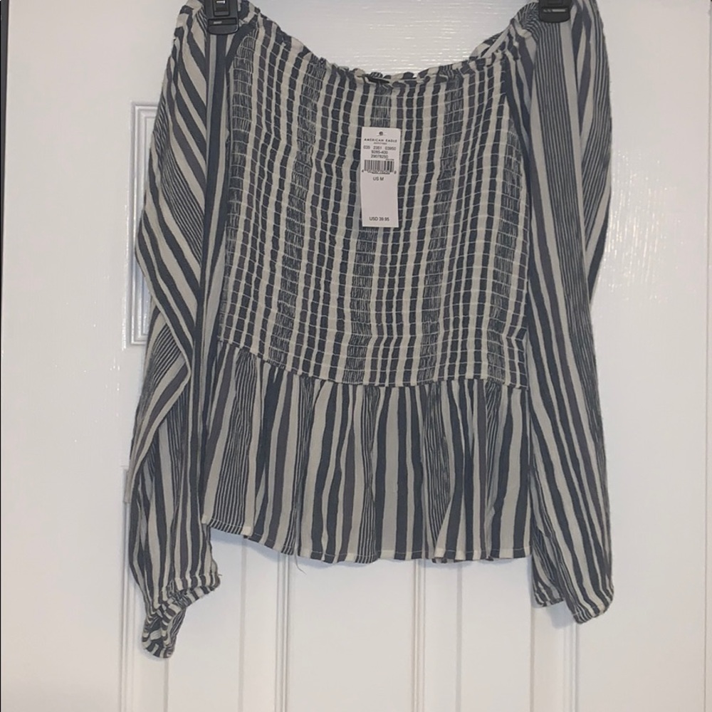 Off the shoulder peplum style shirt